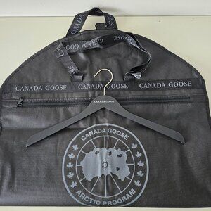New AUTH CANADA GOOSE Black Garment Bag Strap Pocket & Black Branded Wood Hanger